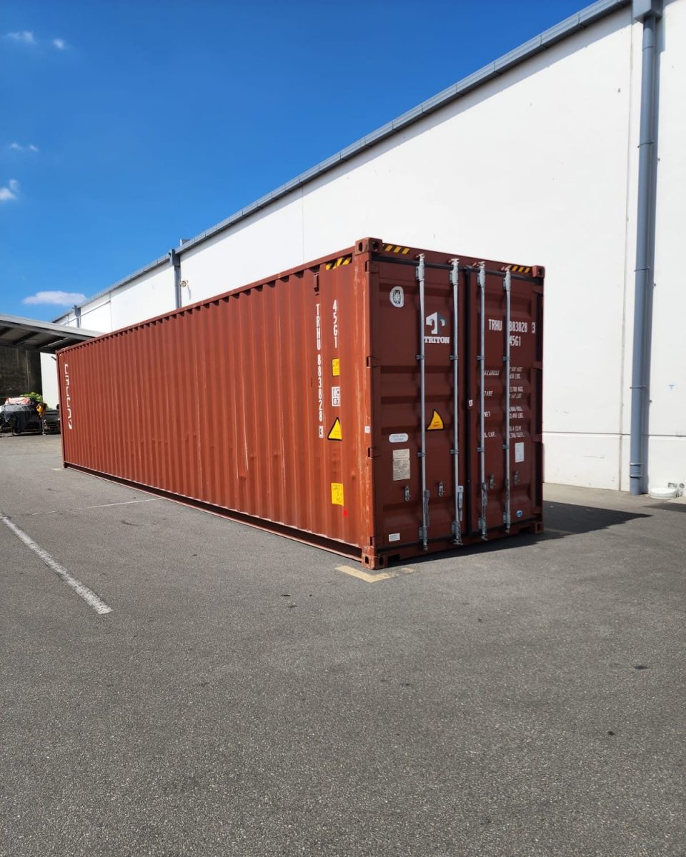 Container with an Isuzu truck in it ready for unwraping and preparing for New Zealand roads